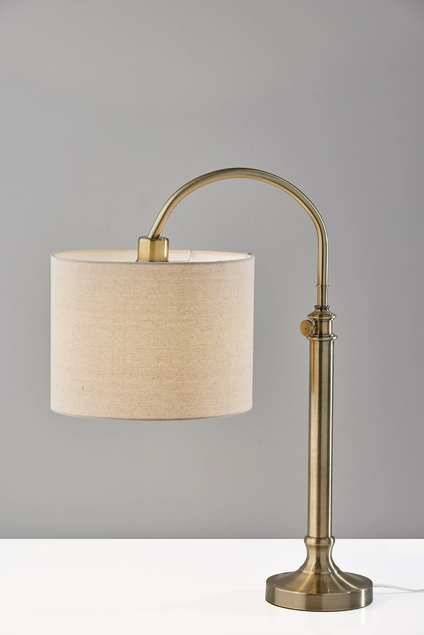 Antiqued Brass Metal Adjustable Arched Lamp With Beige Drum Shade By Homeroots - Image 6