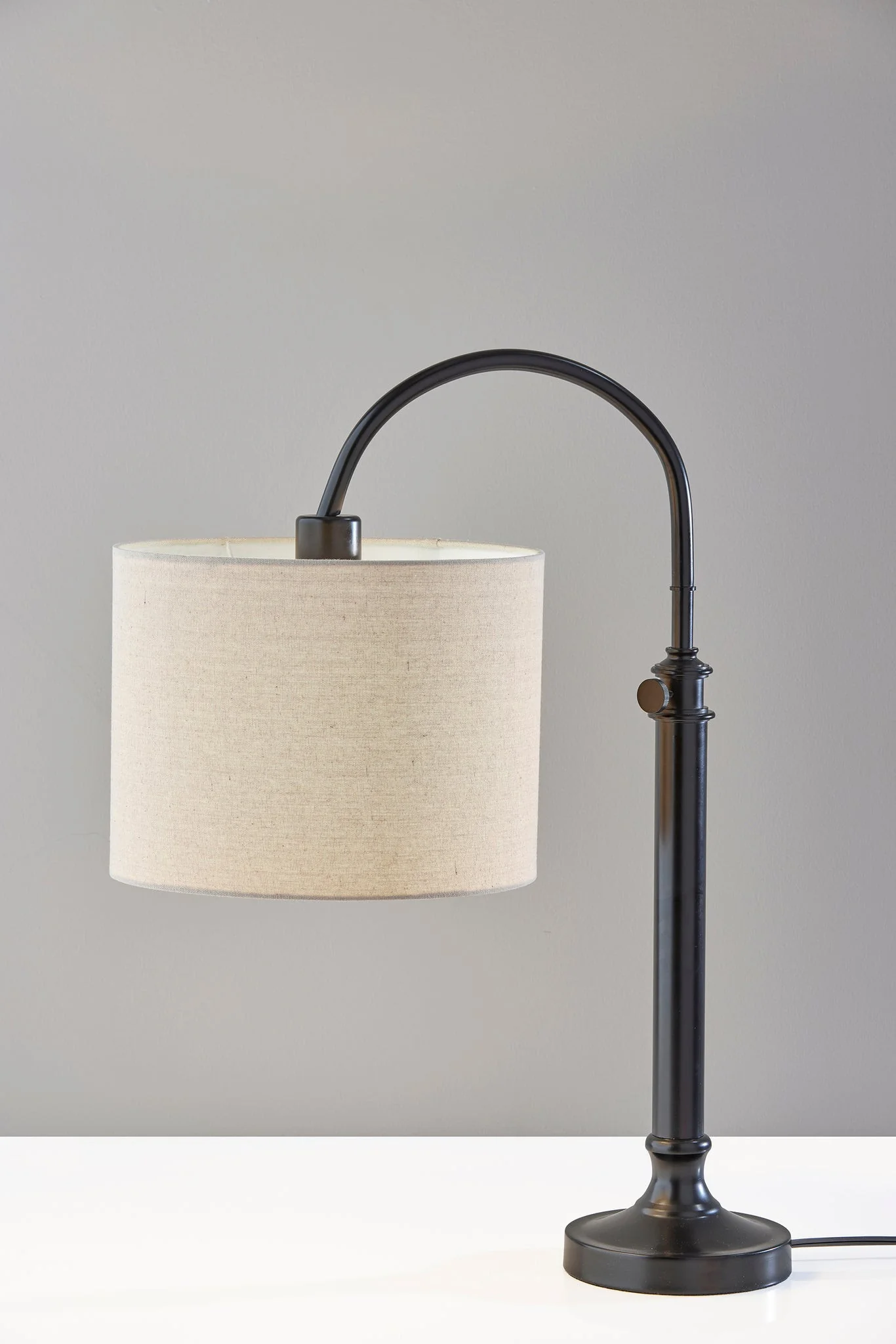 Black Metal Adjustable Arched Lamp With Beige Drum Shade By Homeroots - Image 3