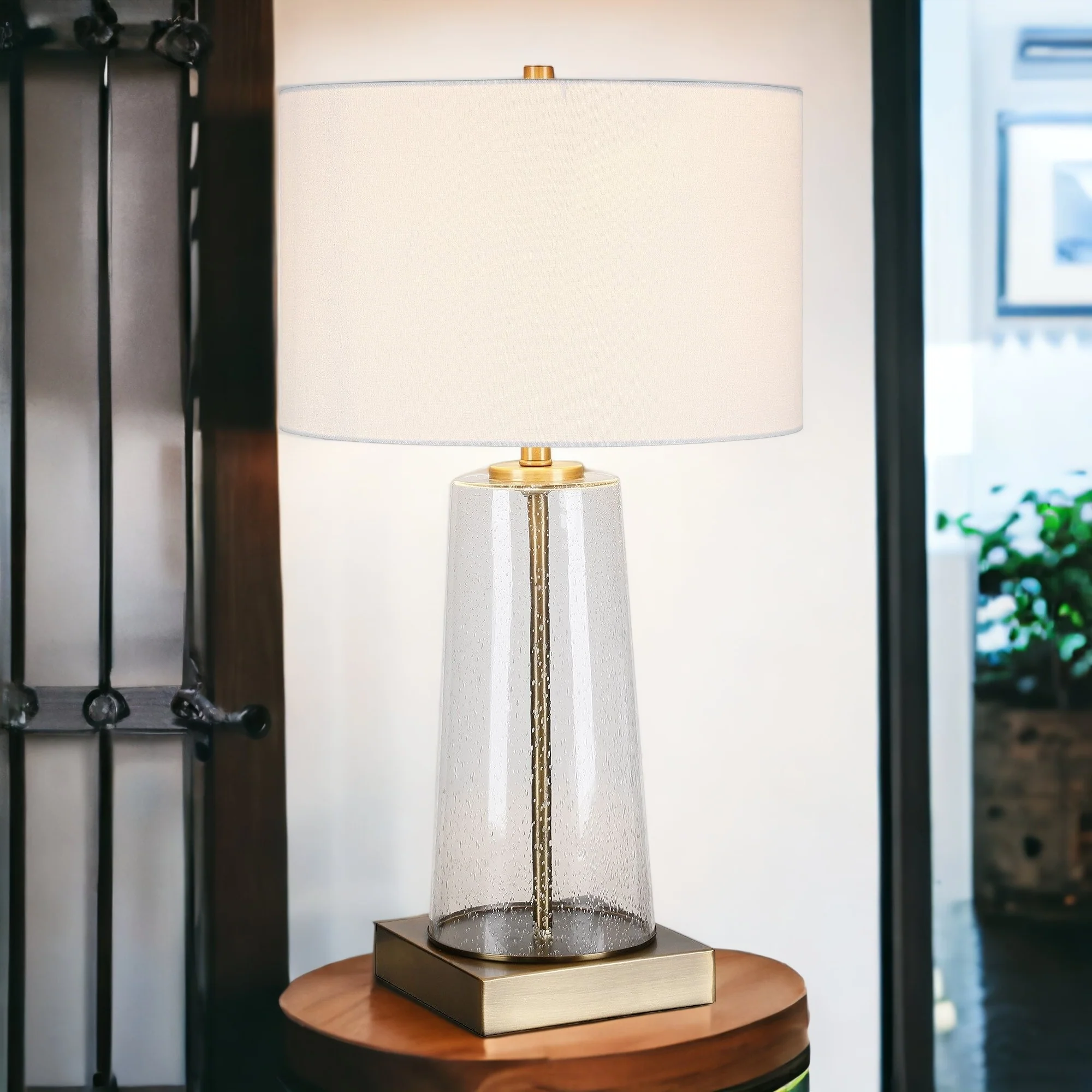 Brass and Clear Metal and Glass Table Lamp With White Drum Shade By Homeroots - Image 7