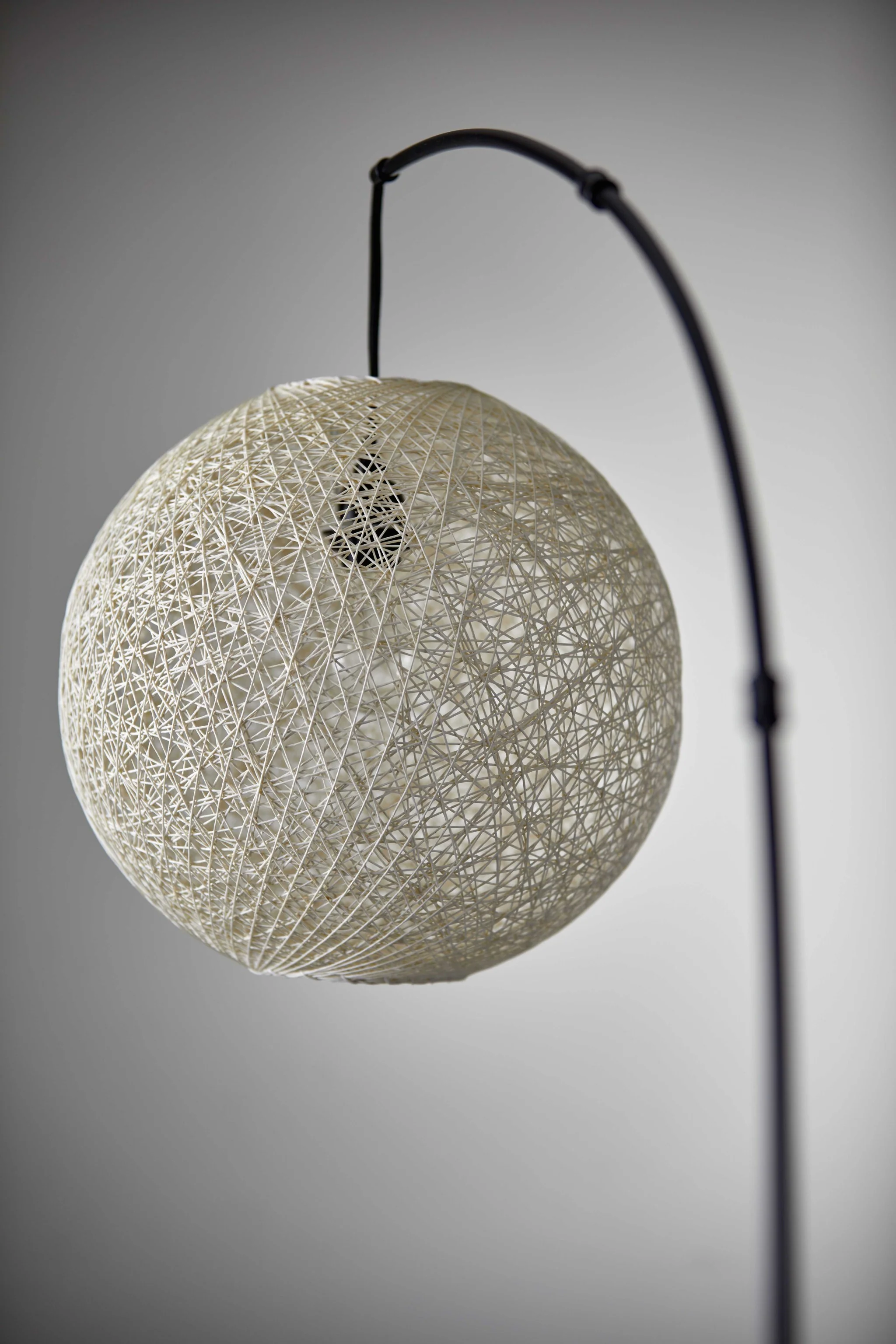 Floor Lamp with Bronze Metal Arc and Groovy Rattan String Ball Shade By Homeroots - Image 2