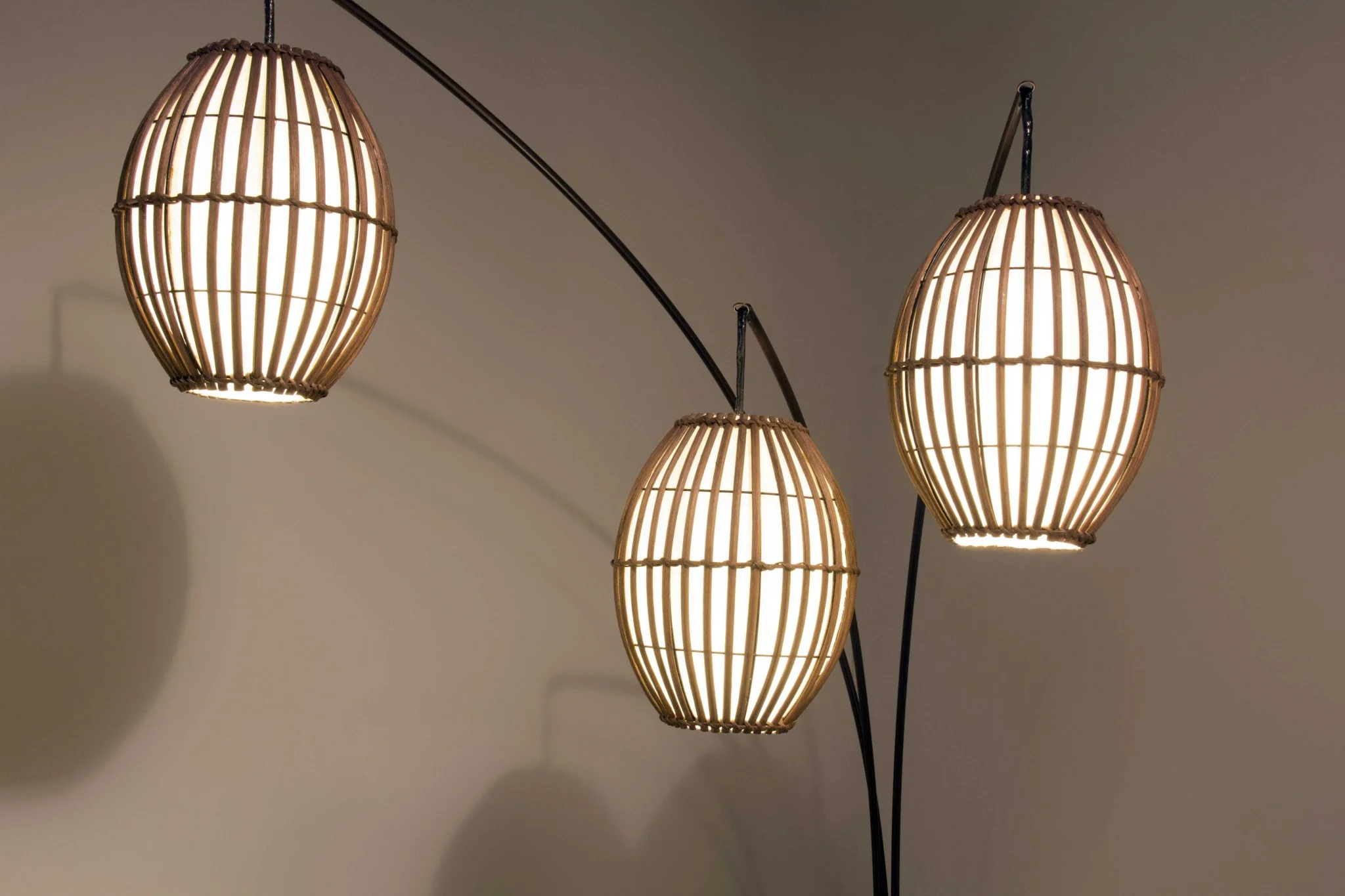 Three Light Arc Lamp in Bronze Metal with Brown Cane Barrel Shape Lanterns By Homeroots - Image 3